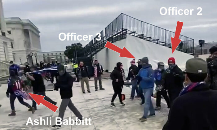 Two undercover Metropolitan Police Department officers walked behind Ashli Babbitt on the northwest side of the Capitol on Jan. 6, 2021. One had earlier remarked that "someone will get shot" that day. (William Pope via U.S. District Court/Screenshot via The Epoch Times)