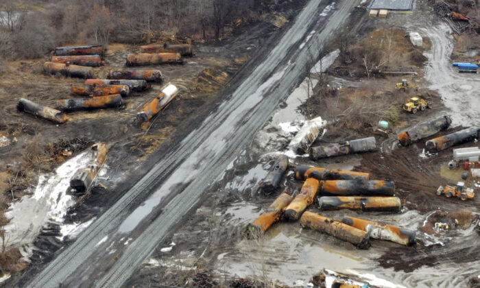 The continuing cleanup of portions of a Norfolk Southern freight train that derailed on Feb. 3 in East Palestine, Ohio. The image was taken on Feb. 9, 2023. (Gene J. Puskar/AP Photo)