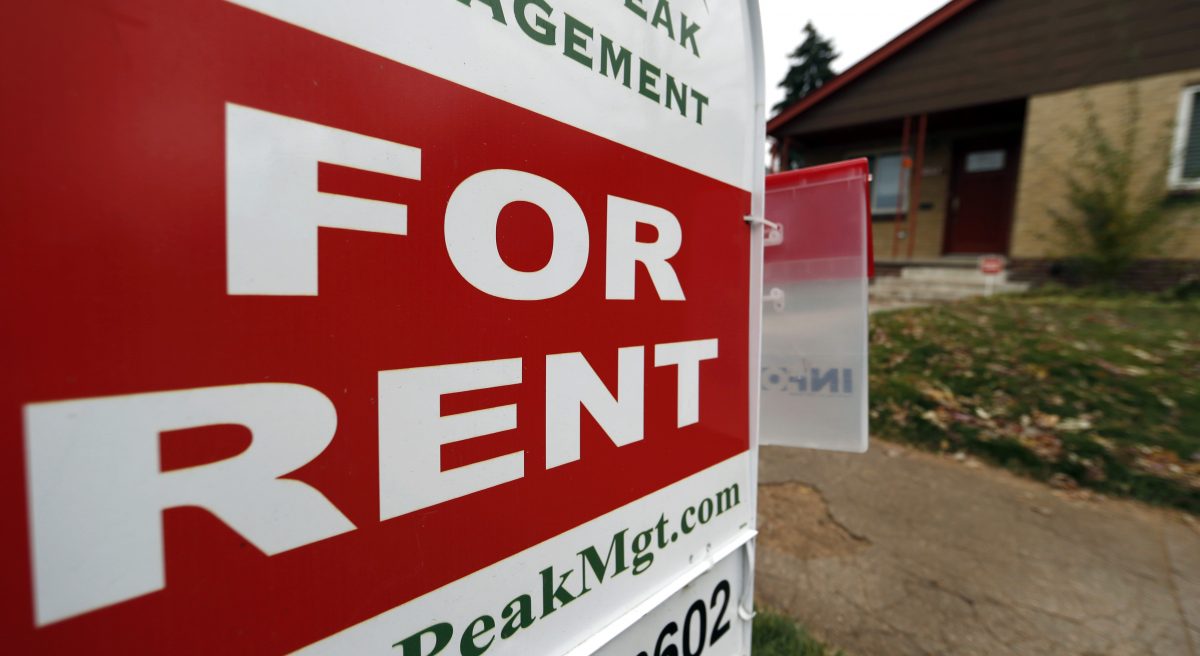 A rental sign is seen outside a property in Denver on Nov. 20, 2015. (AP Photo/David Zalubowski)